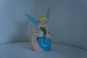 Tinkerbell op een slak peper zoutstel Disney